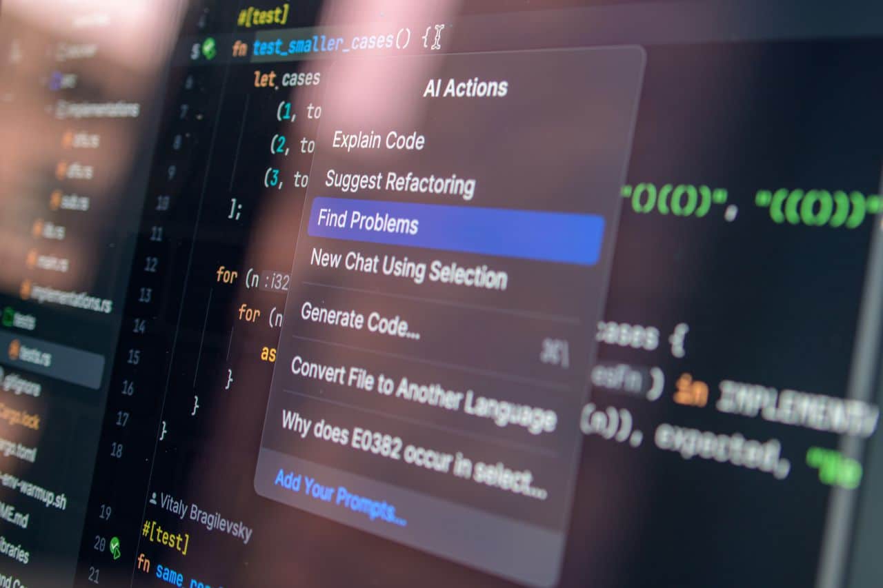 Close-up of AI-assisted coding with menu options for debugging and problem-solving.